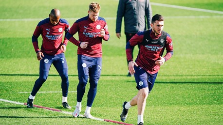 ACTION STATIONS: Aymeric Laporte, Kevin De Bruyne and Fernandinho go through their paces