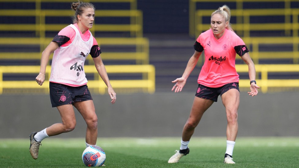 SIZING UP THE OPTIONS: That's Filippa Angeldahl with Steph Houghton in close attendance.