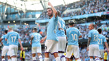 PROUD AS PUNCH: Bernardo acknowledges the City fans