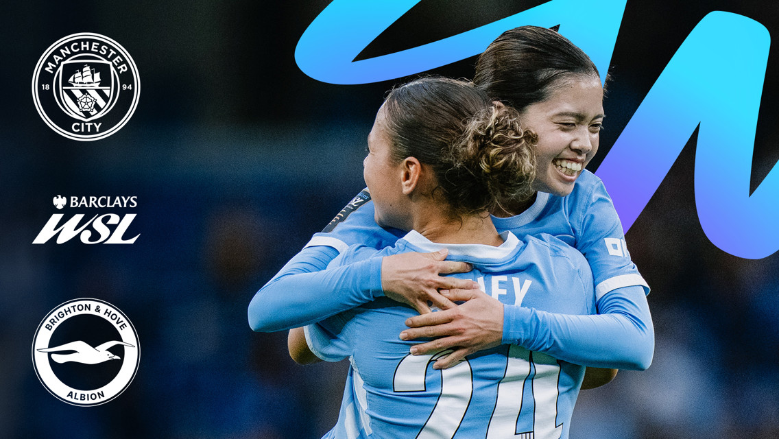 Two Manchester City Women's players celebrate during a Barclays WSL match against Brighton & Hove Albion, featuring team logos and WSL branding.