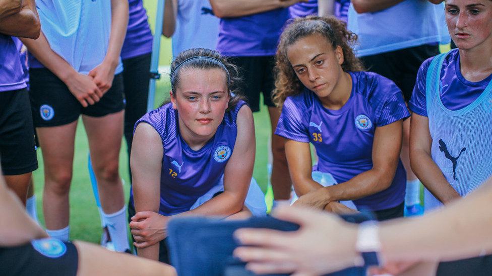 TEAMTALK : The squad listen intently to Nick Cushing's instructions
