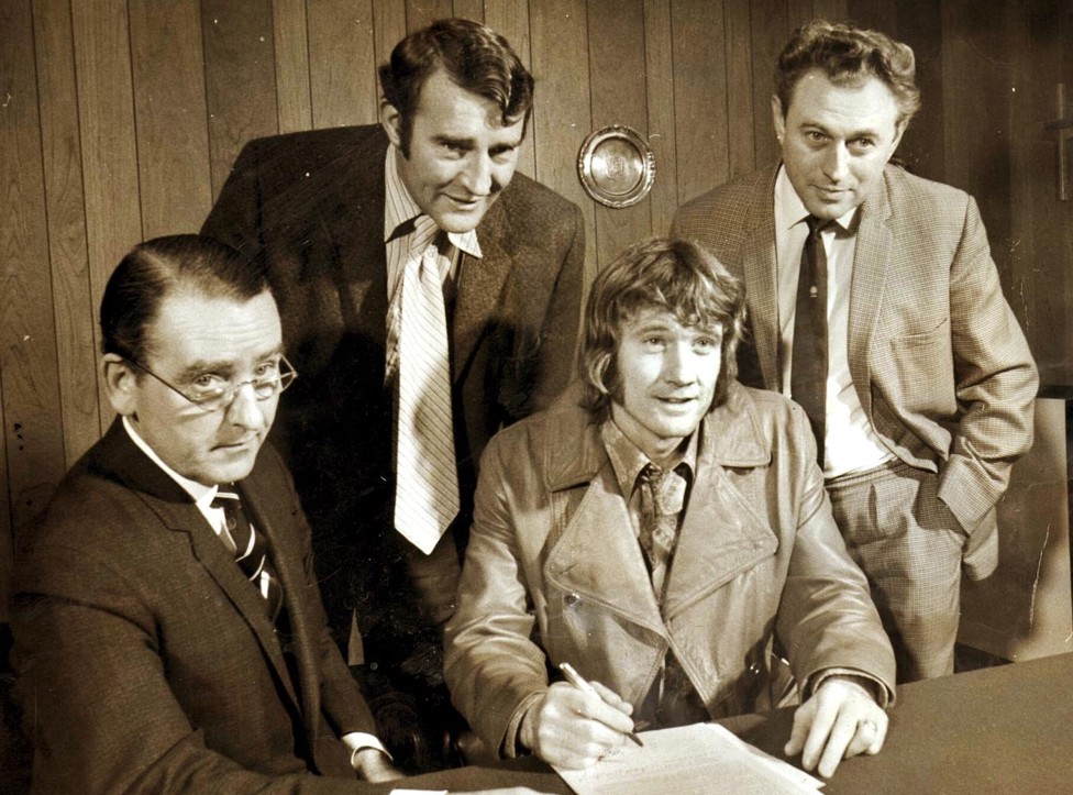 FLASHBACK : Eric Alexander is pictured (far right) alongside former City secretary Walter Griffiths (left) and manager Malcolm Allison as Rodney Marsh signs for City in 1972