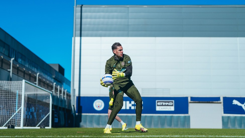 SEND IT BACK : Ederson makes the save and returns the ball