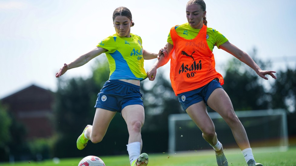 WING PLAY : Jess Park attempts to cross with Codie Thomas in pursuit