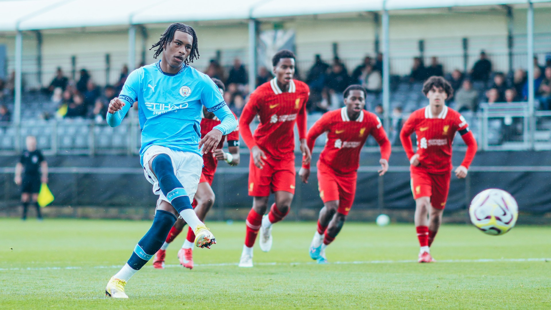 SPOT KICK : Reigan Heskey converts the penalty for City's fourth of the afternoon.