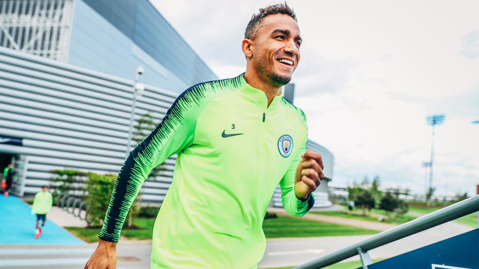 BUOYANT BRAZILIAN : A delighted Danilo strides out
