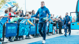MIDFIELD MAESTROS: KDB and Foden greet the fans on the way into the stadium.
