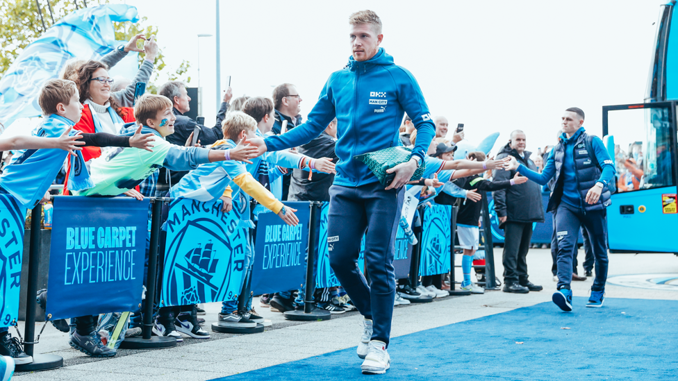 MIDFIELD MAESTROS : KDB and Foden greet the fans on the way into the stadium.