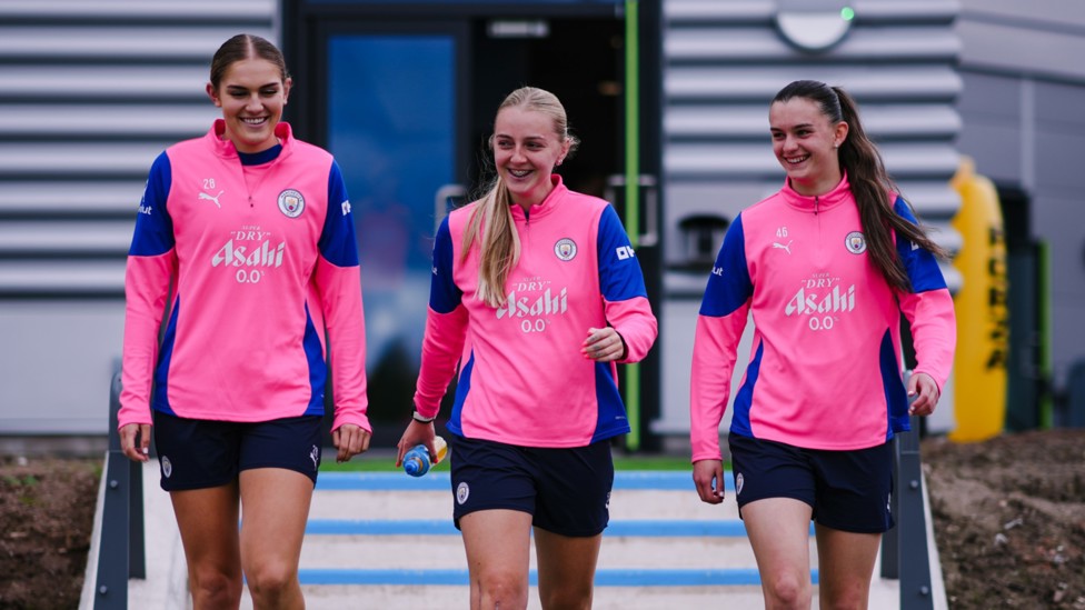 THREE MUSKETEERS : Gracie Prior, Mayzee Davies and Lily Murphy make their way out to training. 