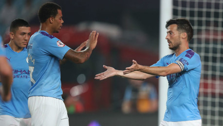 LEVEL BEST: Lukas Nmecha salutes David Silva after Merlin's wonderful goal had brought us back on level terms