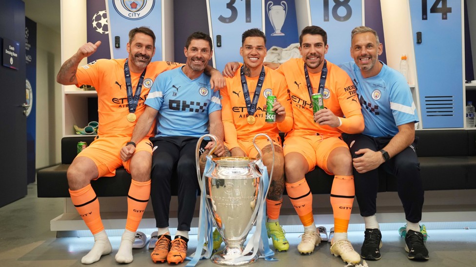 KEEPERS' UNION : The goalkeeping unit celebrate last season's Champions League final win