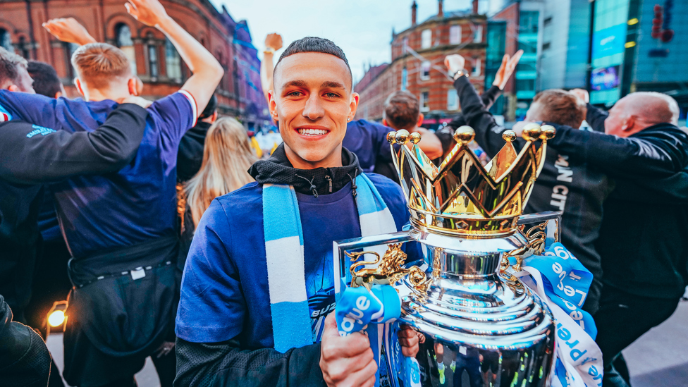 ONE OF OUR OWN: Phil Foden and the Premier League trophy - the perfect match!