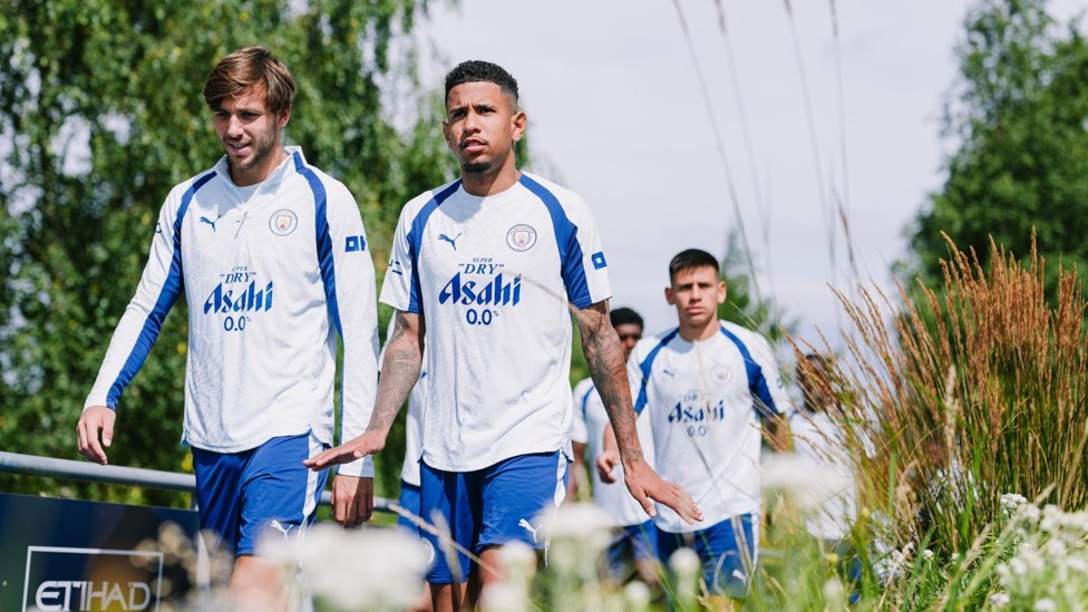 STEPPING OUT : The players head to the pitch