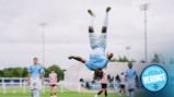 A soccer player in a light blue kit performs a backflip on a field, celebrating a goal. Other players and spectators in the background. 'Official Verdict' text on the image.