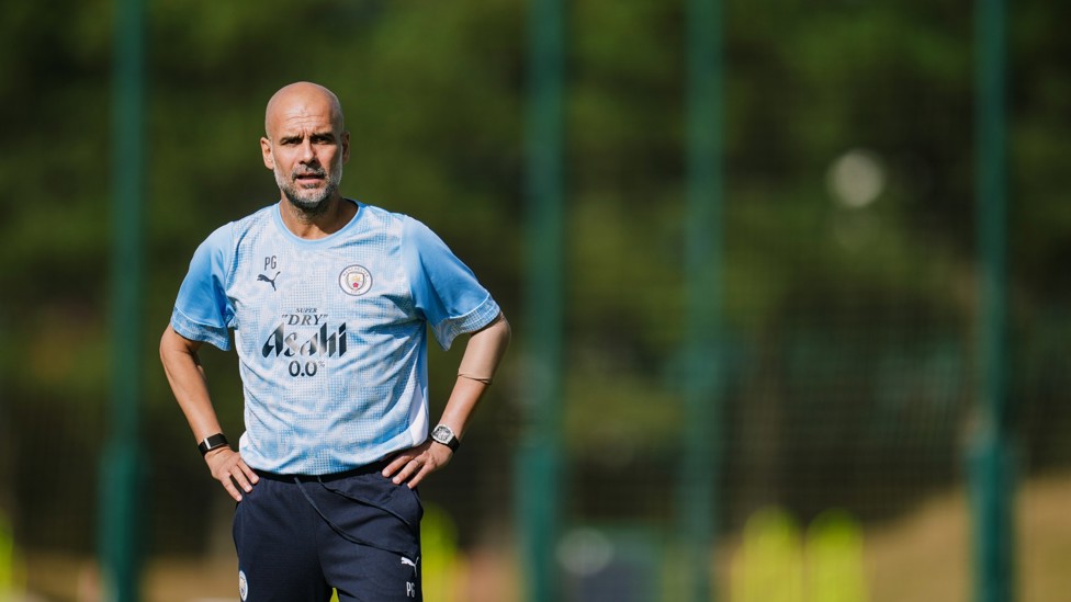 THE BOSS  : Pep Guardiola watches on. 