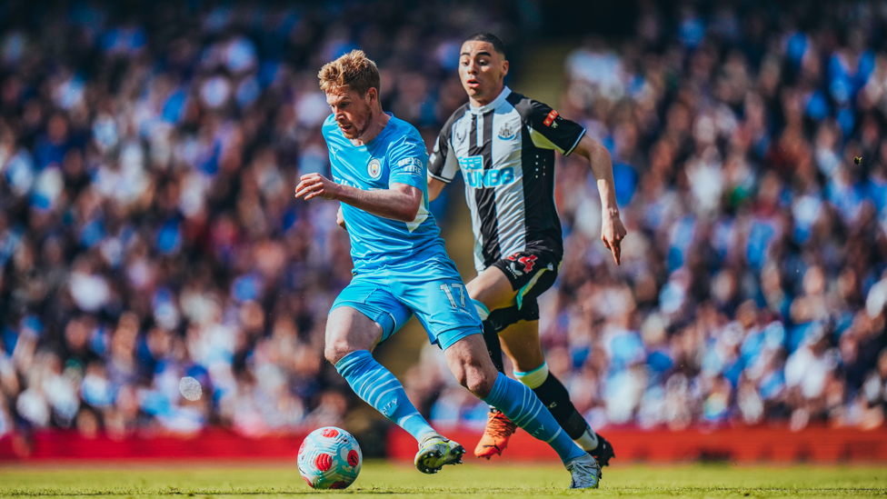 ON THE CHARGE : De Bruyne marches past Almiron.