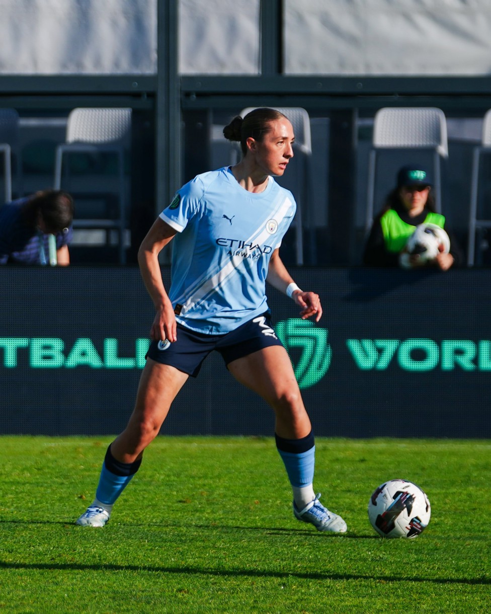 ON THE BALL : Naomi Layzell looks for a pass