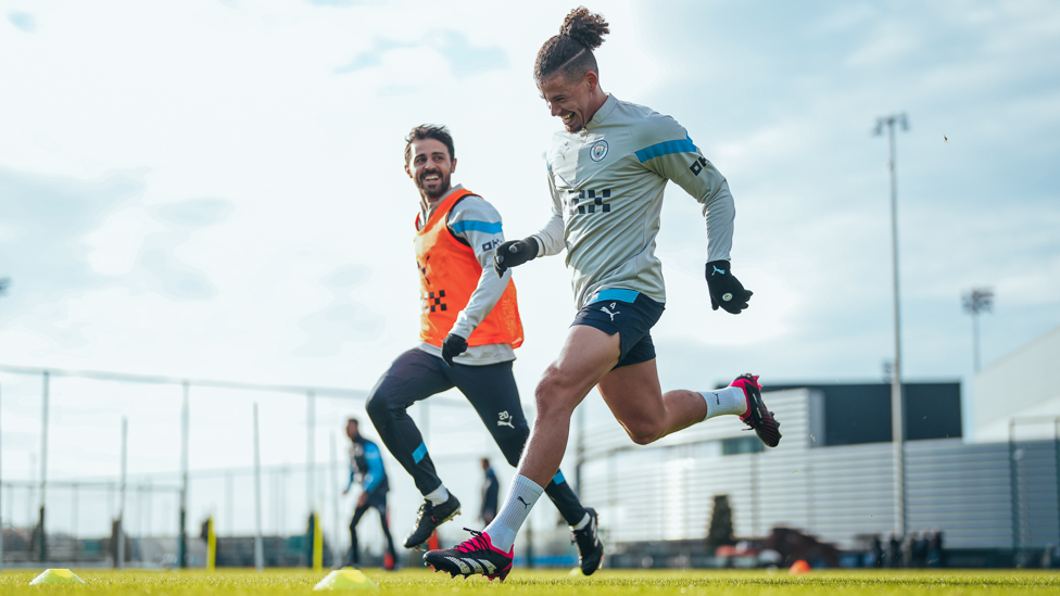RUNNING RACE : Bernardo Silva and Kalvin Phillips do battle on the grass