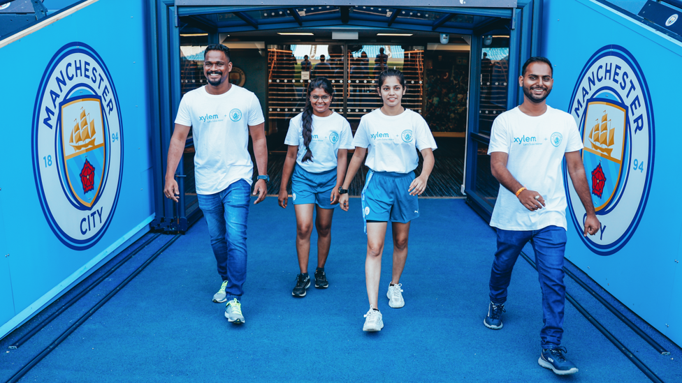 MAKING MEMORIES : The inspiring Young Leaders emulate their football heroes, walking out of the Etihad Stadium tunnel