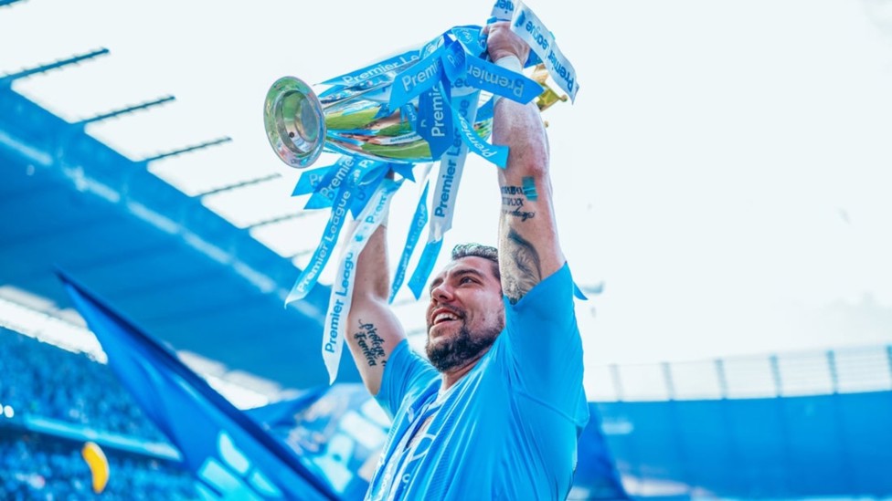 FOUR IN A ROW : Ortega celebrates City's historic fourth successive Premier League title