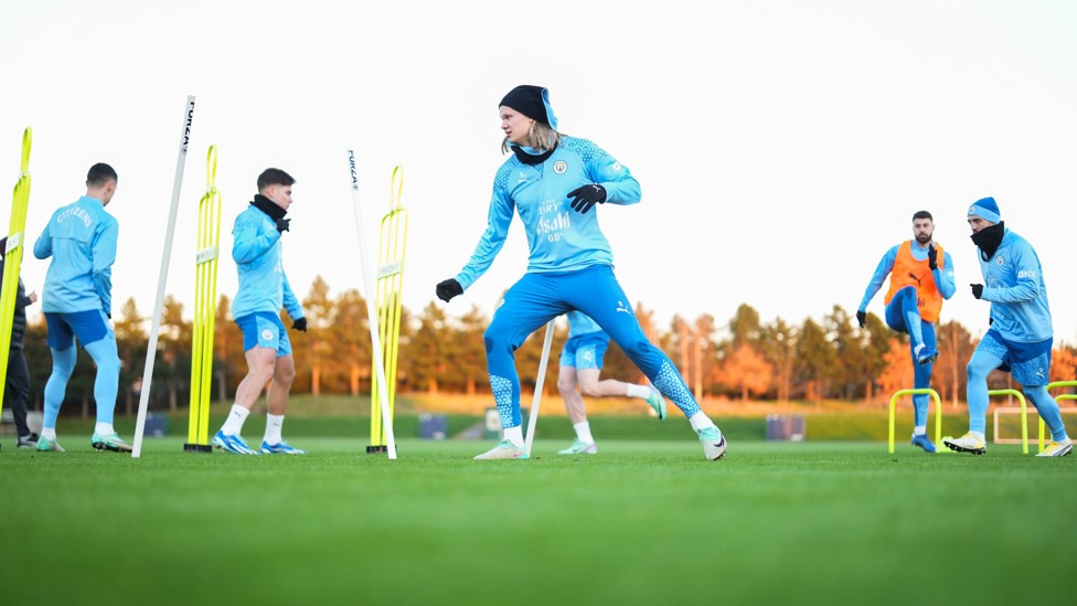 POLES APART : Erling Haaland is put through his paces