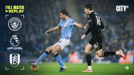 Two soccer players in action during a match between Manchester City and Fulham, featuring logos of the Premier League and City Plus.