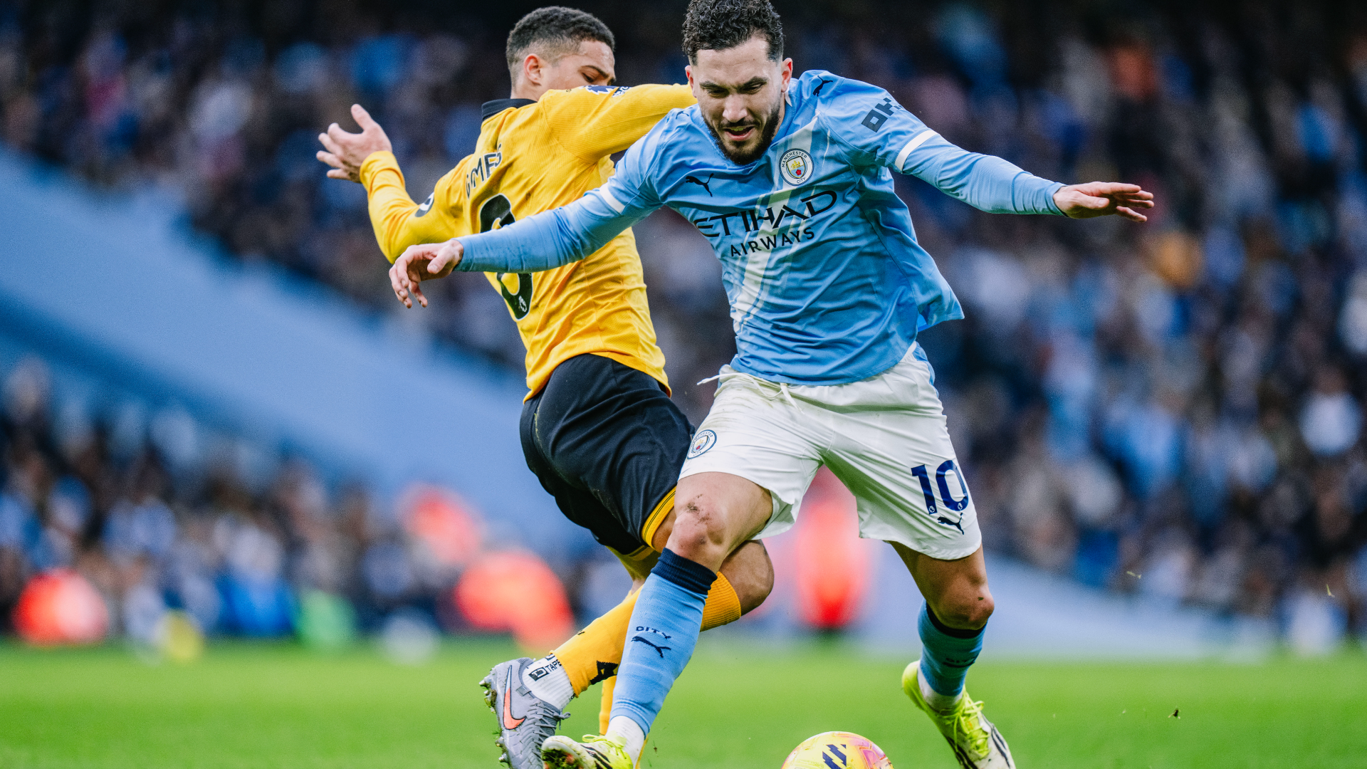 MIDDLE MARCH: Rayan Cherki in the thick of the action.