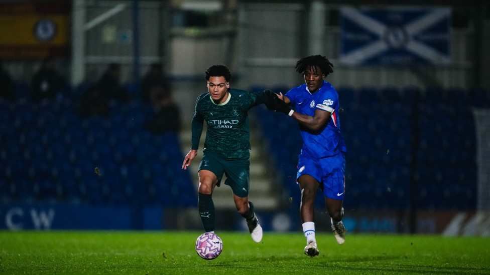 LET BATTLE COMMENCE : Leke Drake holds Chelsea at bay.