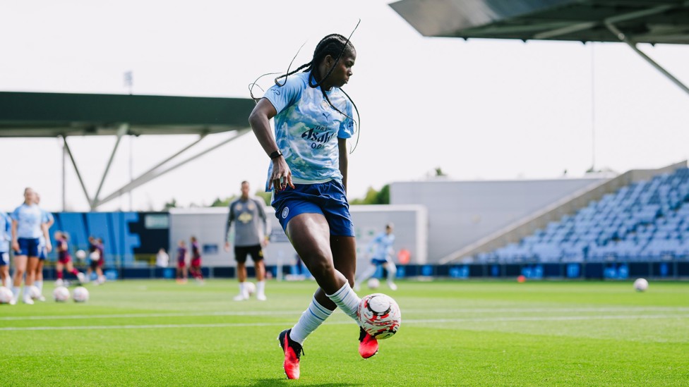 Shooting boots : Khadija 'Bunny' Shaw looks to find the target in the warm ups