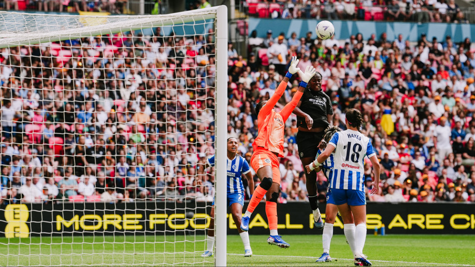 She's not leaving : Bunny Shaw leaping highest to open the scoring at Wembley