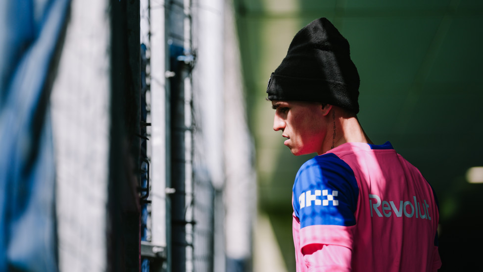 HEADING OUT  : Phil Foden makes his way onto the grass.