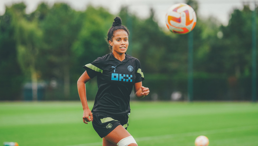 A CLOSE EYE : Mary Fowler watches the ball