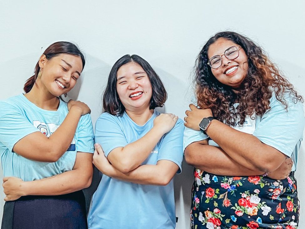 Young Leaders Maxine, Mindy and Thanusha from Dignity Foundation in Kuala Lumpur strike the #EmbraceEquity pose