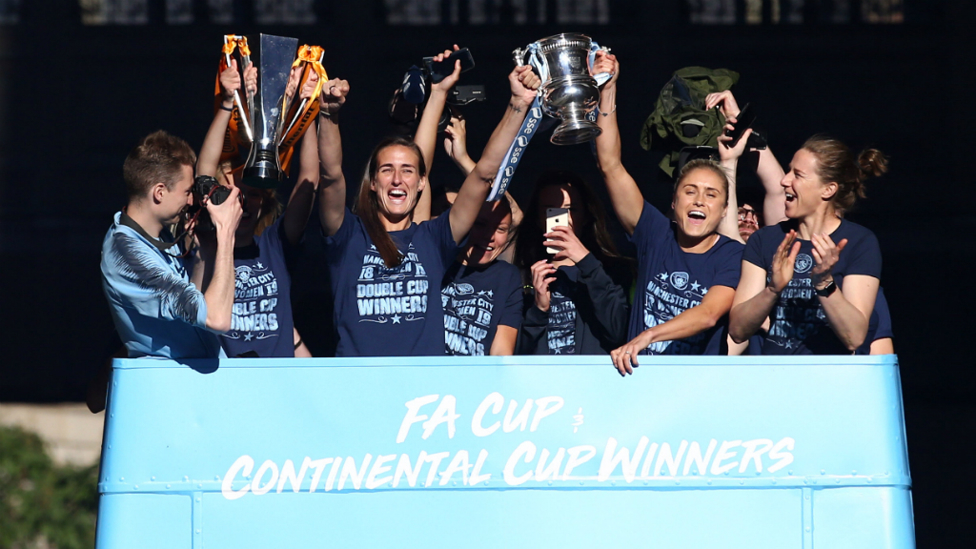 DOUBLE WINNERS : Our women's team bus led the procession, showcasing their double success - the Continental Cup and FA Women's Cups!