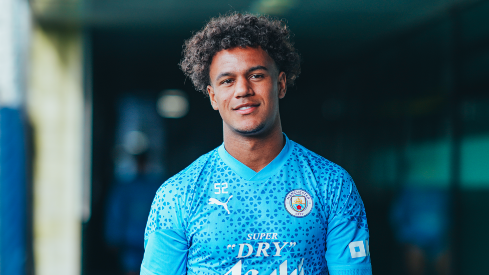 YOUNG GUN : Oscar Bobb makes his way onto the pitch