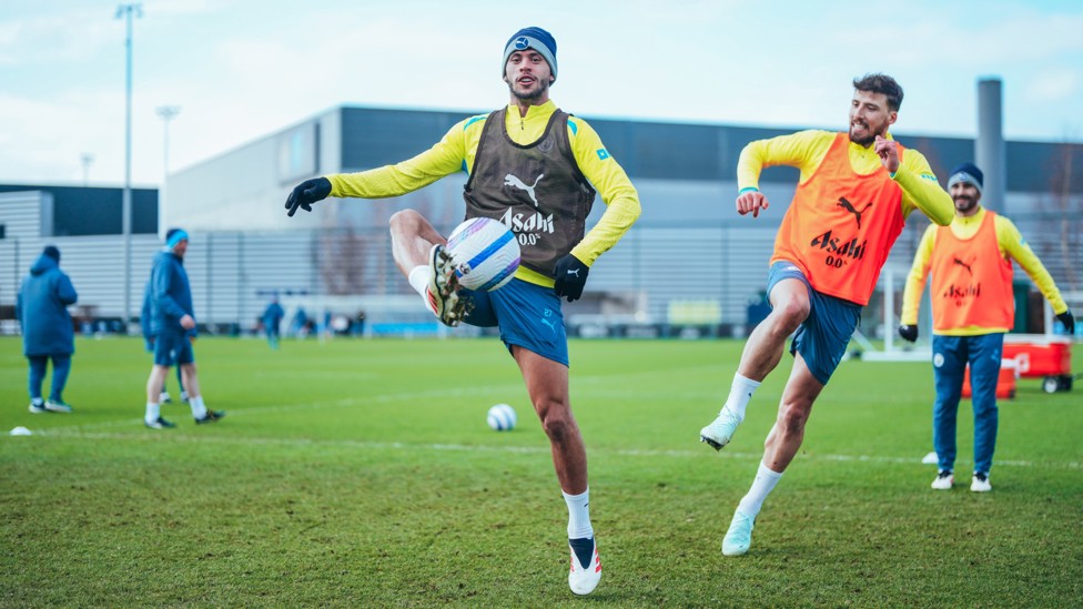 UNDER PRESSURE : Ruben Dias closes down Matheus Nunes.