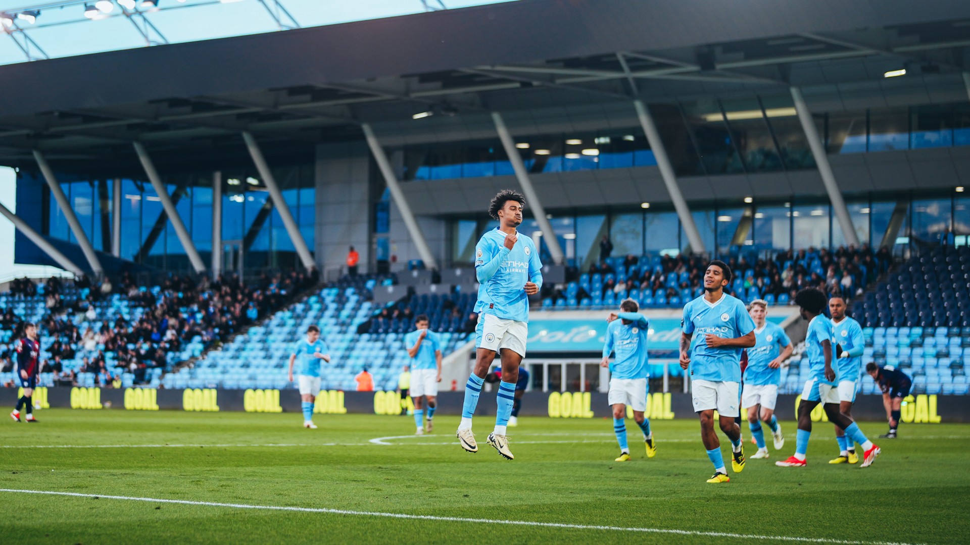 JUMPING FOR JOY : Kane Taylor celebrated his goal that put City ahead.