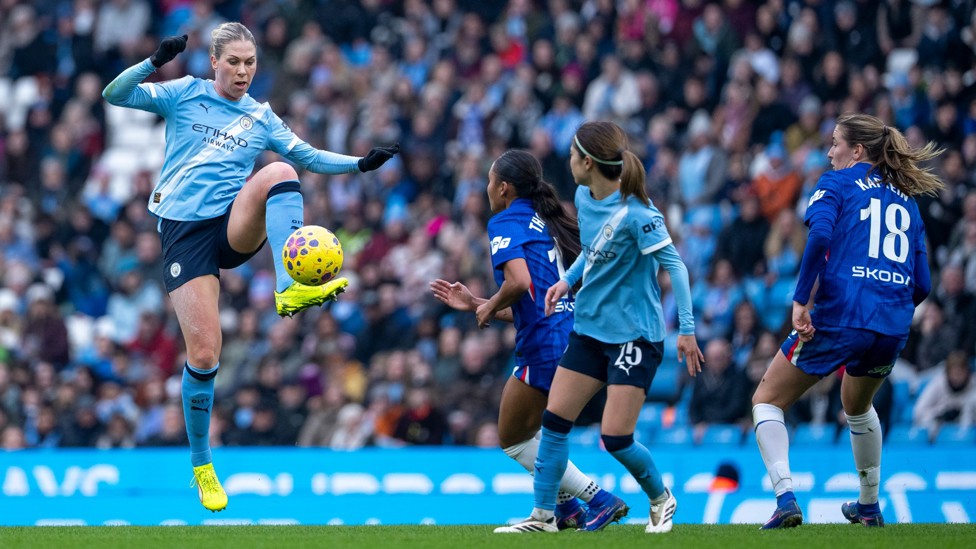 SECURE AT THE BACK: Rebecca Knaak clears the danger