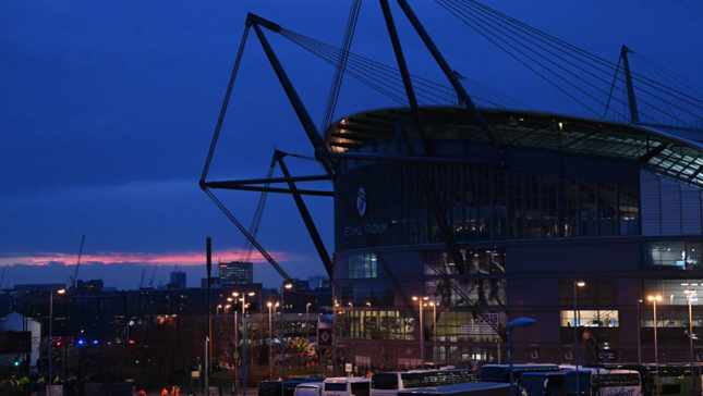 THE STAGE IS SET: The Etihad Stadium, silhouetted by a beautiful backdrop