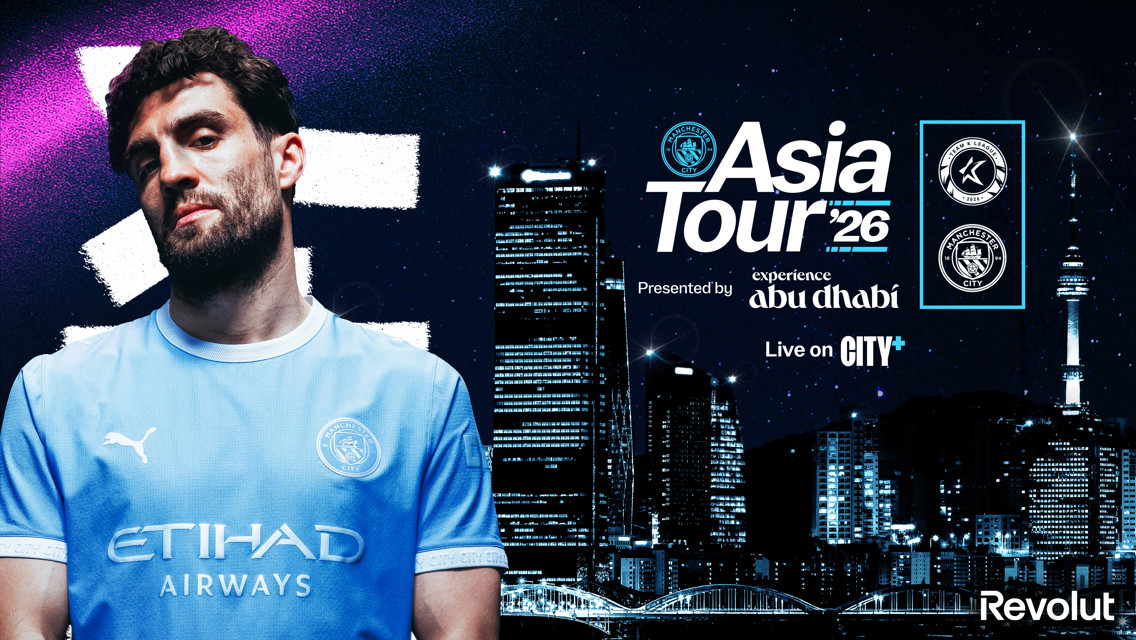 Promotional image for Manchester City's Asia Tour 2026, featuring a player in a light blue kit, logos of Manchester City and Experience Abu Dhabi, skyline background, and presented by Revolut.