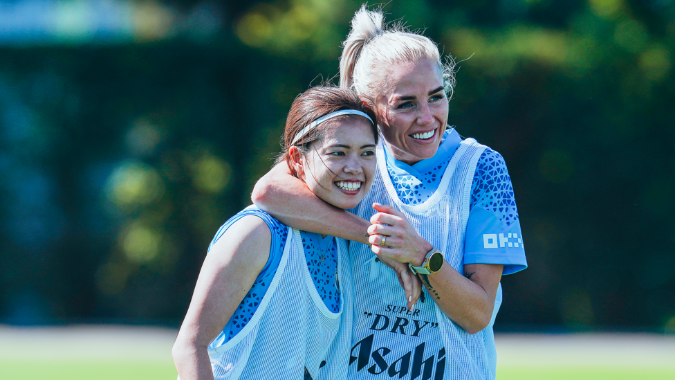 TOUCH TIGHT : Yui Hasegawa and Alex Greenwood share a hug