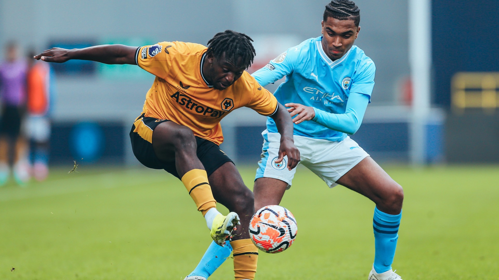 WORKING HARD : Lakyle Samuel looks to regain possession for City. 