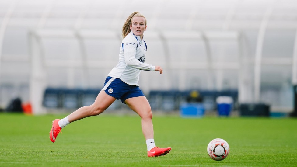 WINGING IT : Lauren Hemp goes down the flank