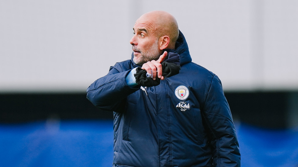 POINTING THE WAY : Pep Guardiola takes charge