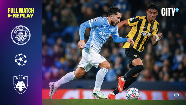 A player in a light blue Manchester City kit is in action against a player in a yellow and black AEK kit. The left side includes logos for Manchester City and AEK Athens, 'Full Match Replay,' and the Champions League logo.