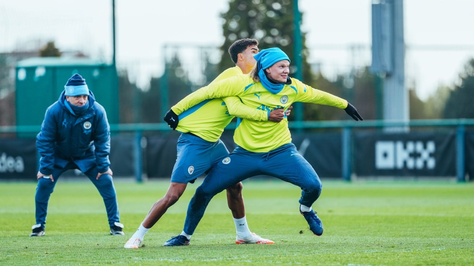 TOUCH TIGHT  : Vitor Reis and Erling Haaland do battle.