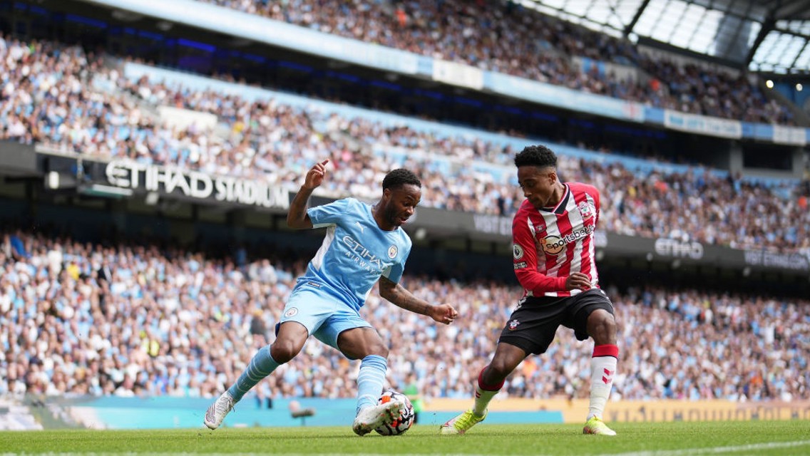 RAZZLE DAZZLE: Sterling takes on Walker-Peters.