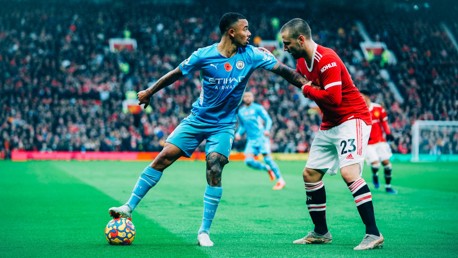 UNDER CONTROL: Jesus holds off Shaw and looks for support.