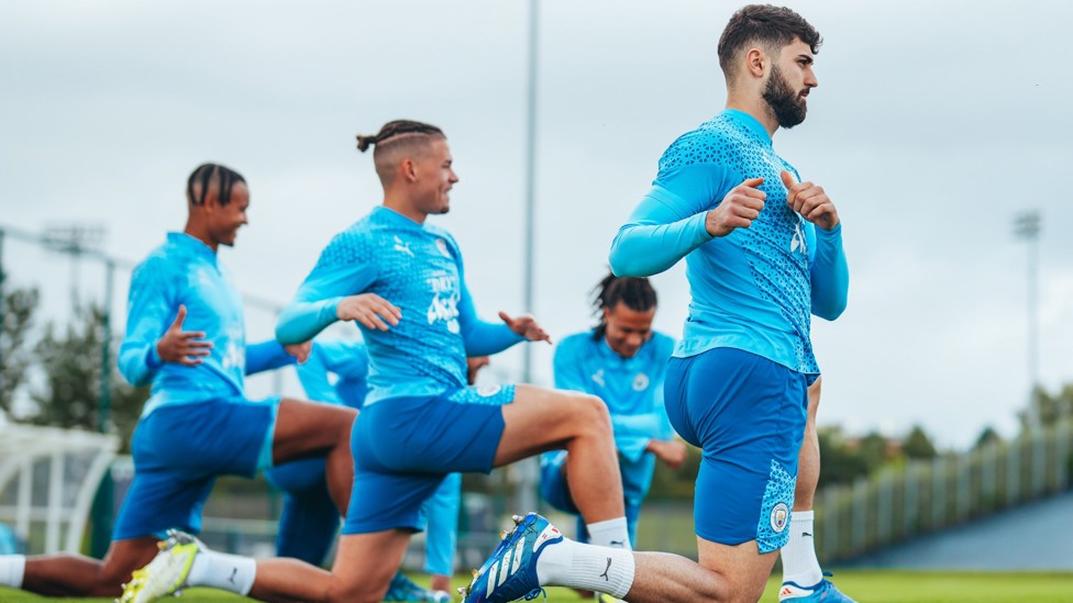 KNEES UP : City players go through their warm ups