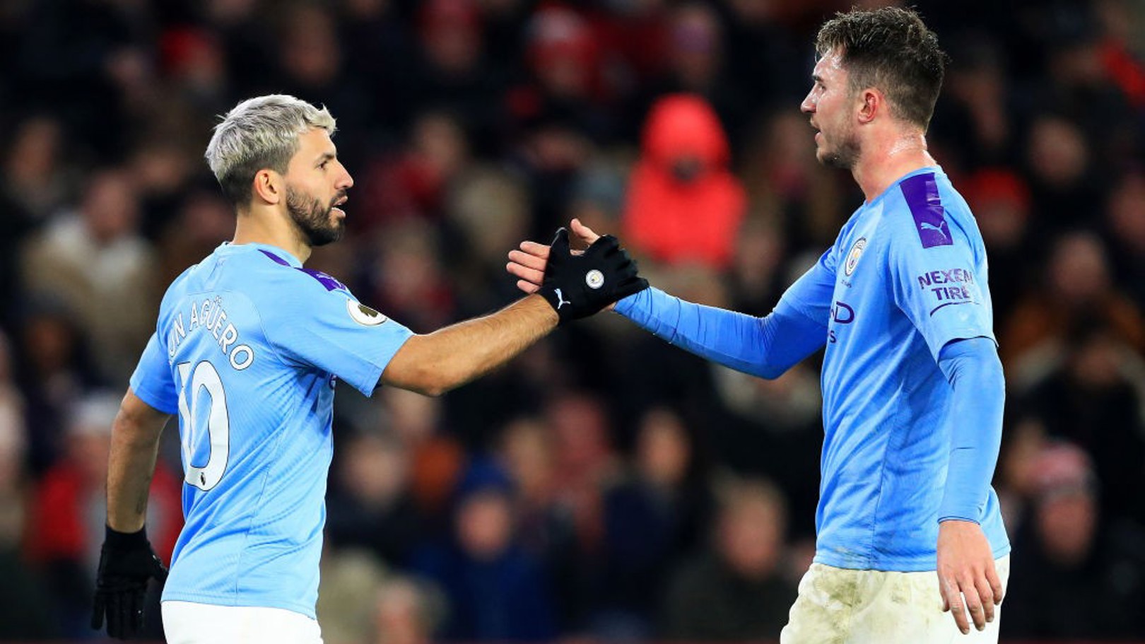 HIGH FIVE: Sergio Aguero celebrates with Aymeric Laporte.